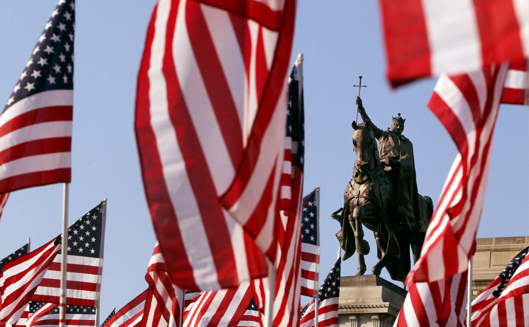 2016: Flags frame King Louis IX statue